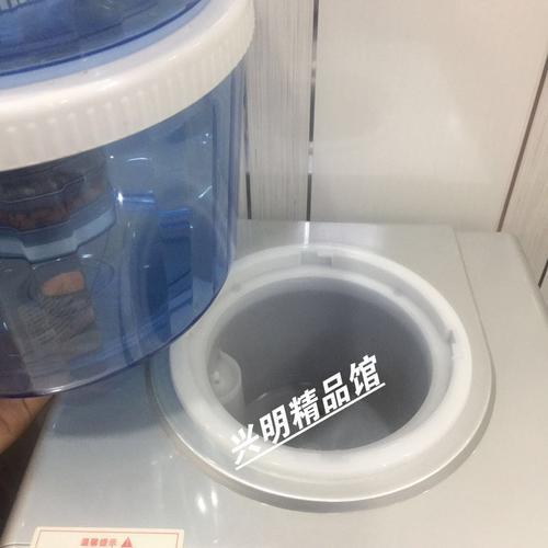 怎么打开饮水机水桶盖 饮水机水桶盖的正确打开方法